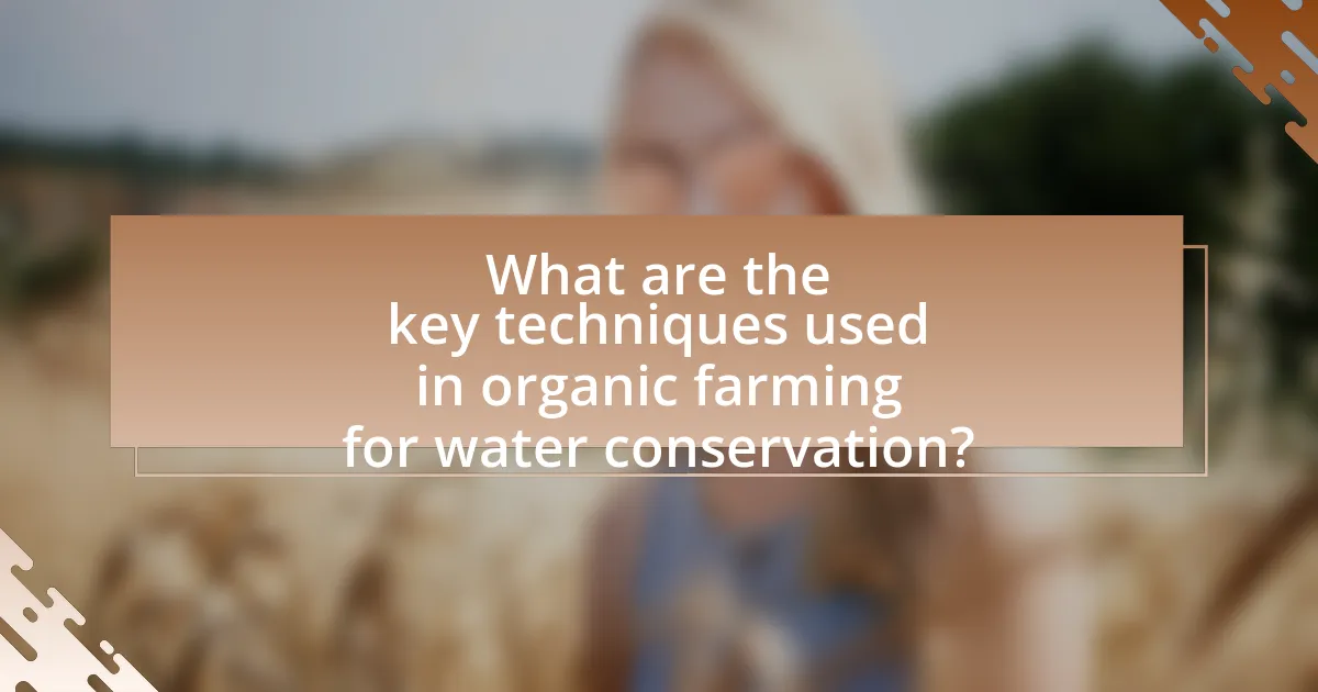 What are the key techniques used in organic farming for water conservation?